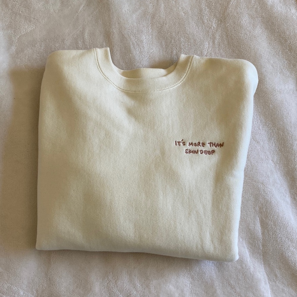 Beauty Within Cream Crewneck It’s More Than Skin Deep